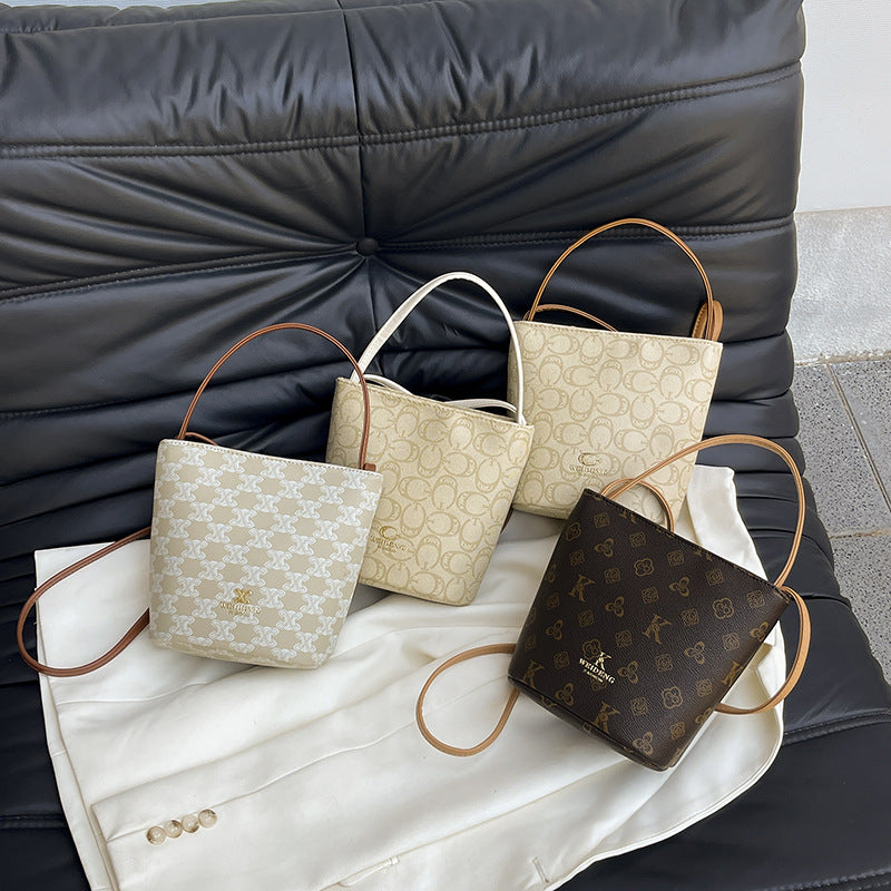 Guteco's new textured bucket bag fashion handbag women's 2025 new large-capacity messenger bag mobile phone bag