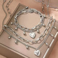 Stainless steel european and american style heart bead double layer necklace and bracelet set - premium women's jewelry