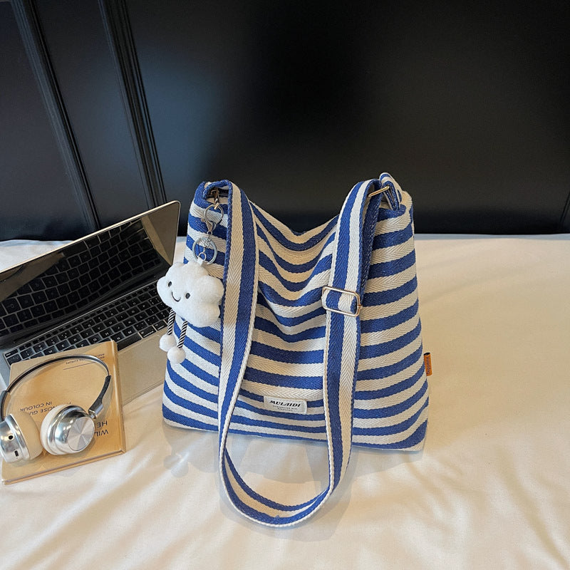 Cross-border striped bag women's large capacity 2025 new summer versatile casual messenger bag college student class tote bag