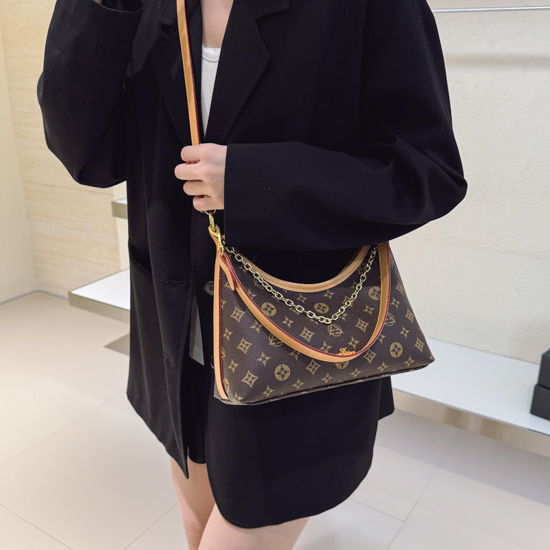 accessible luxury retro old flower crescent women's 2025 new trendy large capacity commuter versatile shoulder crossbody bag wholesale