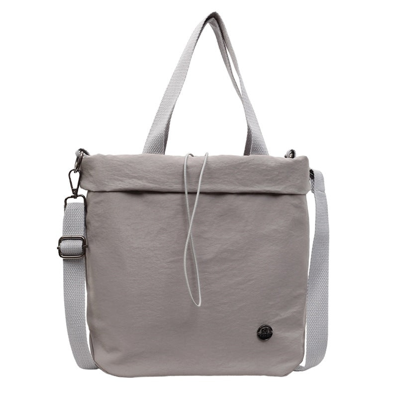 Casual bag women's 2025 new nylon drawstring bundle shoulder bag fitness yoga messenger bag commuter tote bag