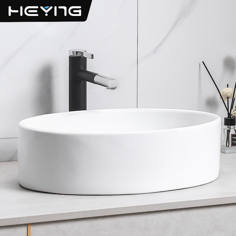 陶瓷一体洗手盆简约椭圆艺术台上盆卫生间小户型洗漱单盆厂家批发