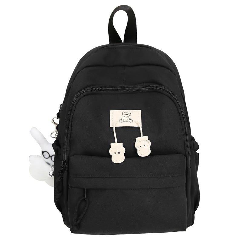School bag female college student Korean version ins solid color simple and versatile junior high school student travel small backpack high school student backpack