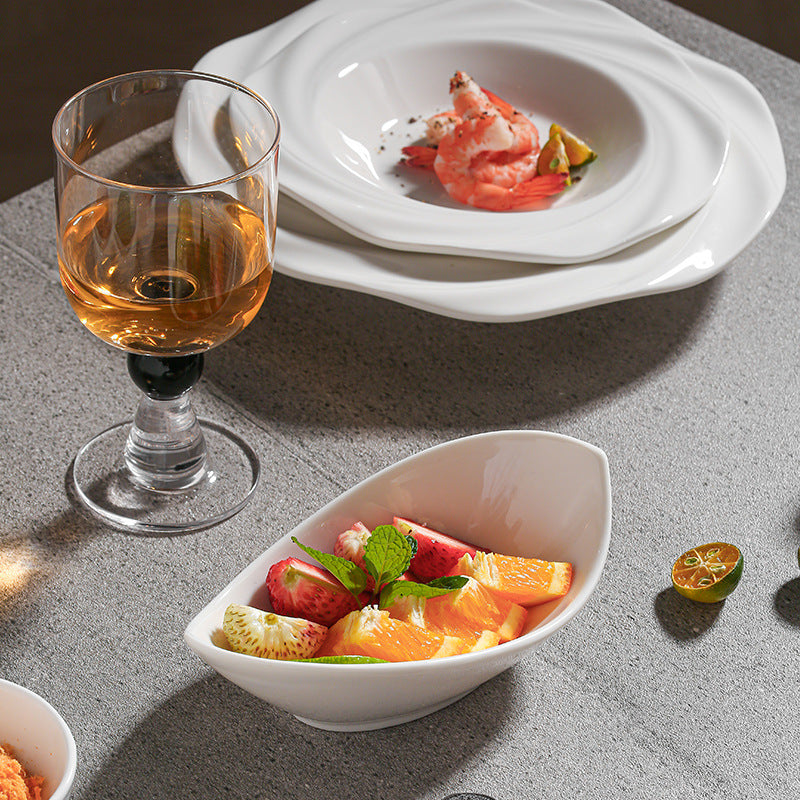 Minimalist pure white ceramic dinnerware set for home, restaurant, and hotel use - porcelain plates, creative plating, and dessert bowls