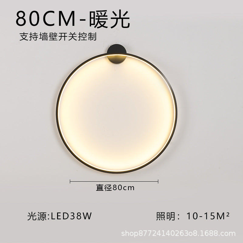 Minimalist chic large round wall sconce - stylish ambient lighting for living room backdrops, bedroom headboards, and more