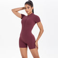 Large backless half open zipper short sleeve yoga jumpsuit dance fitness jumpsuit nude tight sports jumpsuit