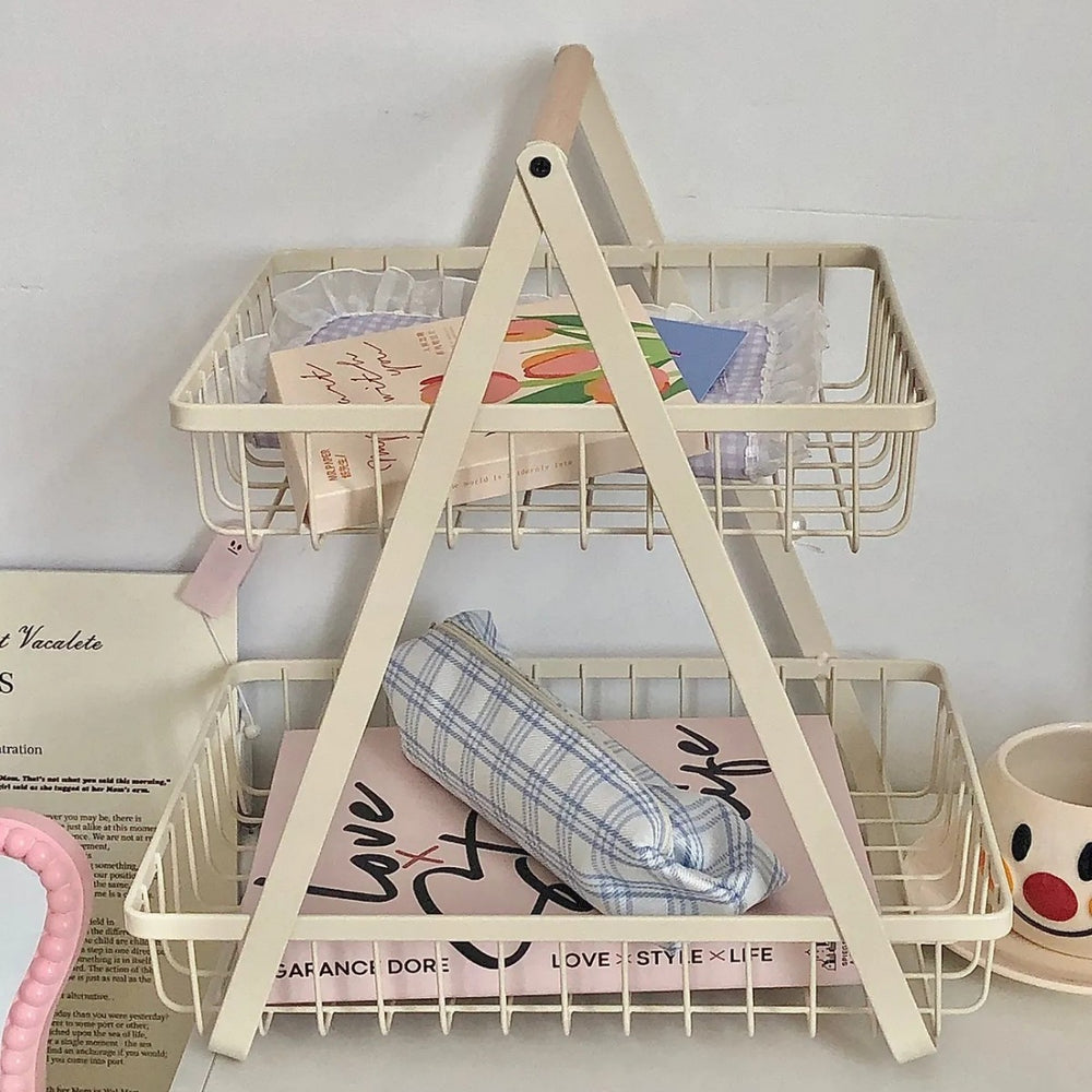 Here are a few options, depending on the specific nuance you want to convey:  **option 1 (most common & versatile):**  double-layer desktop organizer basket - home storage for snacks, fruits, and vegetables  **option 2 (more descriptive):**  two-tier desk