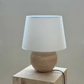 Wabi-sabi style natural travertine table lamp, vintage and mid-century modern bedroom and living room ambient lighting, japanese and korean ins-style bedside lamp