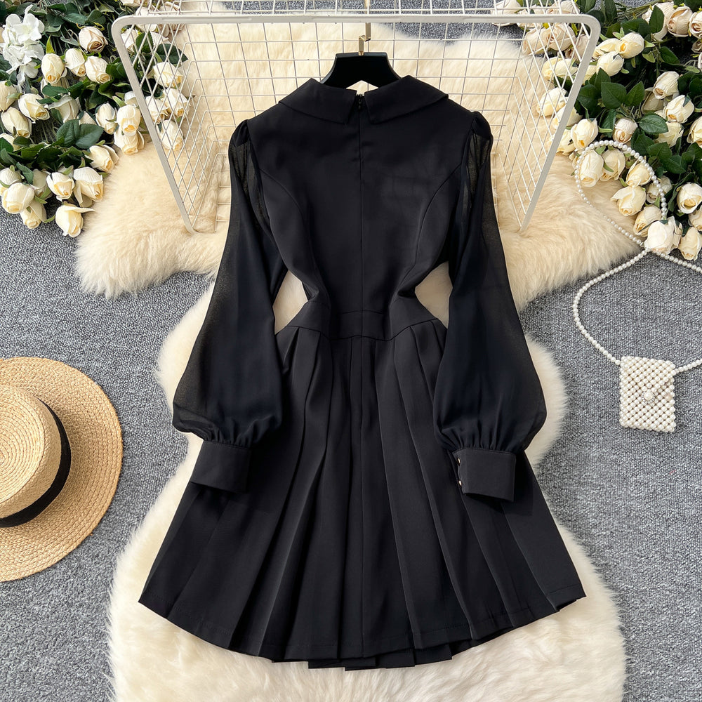 Black suit collar dress for women, 2024 autumn collection, high-end double-breasted design, cinched waist, long sleeves, pleated little black dress, mini skirt