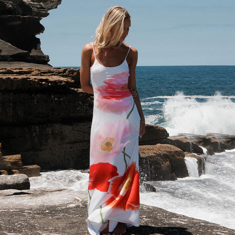 Summer European and American holiday style printing temperament long dress big flower contrasting color suspender backless A-word dress beach dress