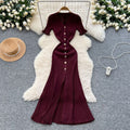 Elegant and sophisticated v-neck short-sleeve knit dress for women, perfect for summer. features a slimming, single-breasted design with a slit and shimmering silk details. a long, chic sweater dress