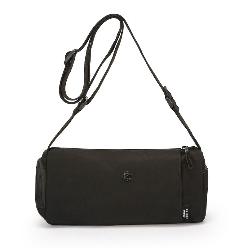 Simple Japanese shoulder bag women's nylon anti-splashing cylinder pillow bag trendy cool messenger bag commuter portable handbag
