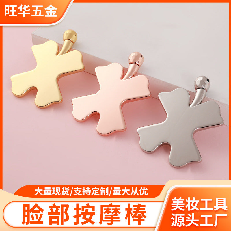 Factory direct clover-shaped massage facial roller - metal scraping tool for face, eye, and neck lifting - wholesale
