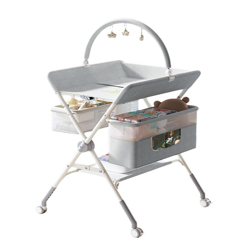 Baby changing table - newborn diaper changing, bathing, massage, and bed - foldable multifunctional baby bed