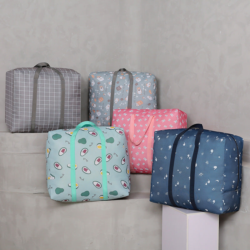 Oxford cloth quilt bag, clothes storage bag, student moving duffel bag with zipper, dust-proof packing bag wholesale.