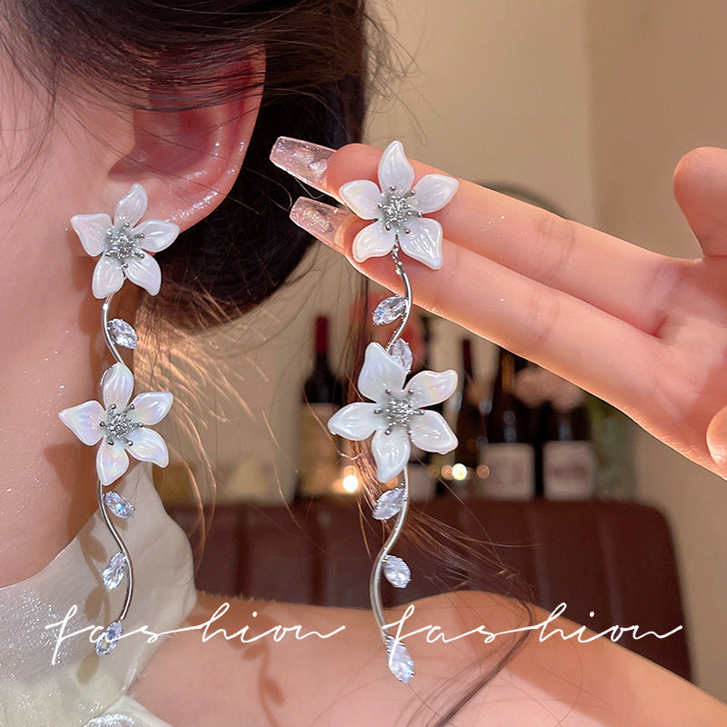 French chic zircon tassel flower stud earrings - perfect for summer getaways, beach photoshoots, and adding a touch of glam to your look
