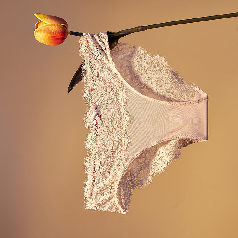 lingerie factory: low-rise, sexy women's panties featuring bow accents, lace detailing, and a breathable, criss-cross design. women's briefs