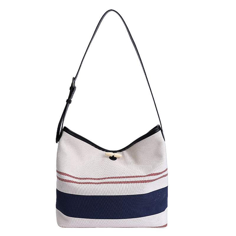 Cross-border striped canvas bag women's large capacity 2025 new summer versatile shoulder messenger bag college student tote bag