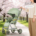 Lightweight, large-wheeled, foldable baby stroller. convertible from upright to reclined position. portable, high-view, four-wheel suspension stroller for ages 0-3 years