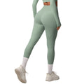 new arrivalhigh waist hip lifting tight yoga pants nude quick-drying flap pocket pants outdoor running fitness sports pants
