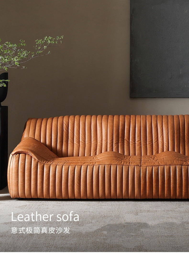 Minimalist mid-century modern genuine leather sofa for living room, homestay, designer american retro oil wax leather caramel color wavy sofa