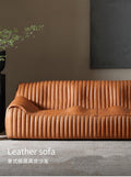 Minimalist mid-century modern genuine leather sofa for living room, homestay, designer american retro oil wax leather caramel color wavy sofa