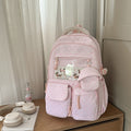 Japanese-inspired, minimalist, and trendy backpack for women. features a delicate floral design, perfect for casual use, school, or class. a versatile, large-capacity backpack that's easy to match with any outfit