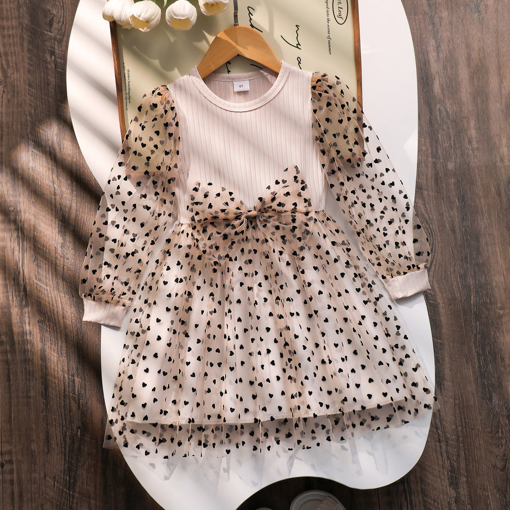 Girls' dress for toddlers and young children, featuring a bow, heart, and polka dot mesh skirt