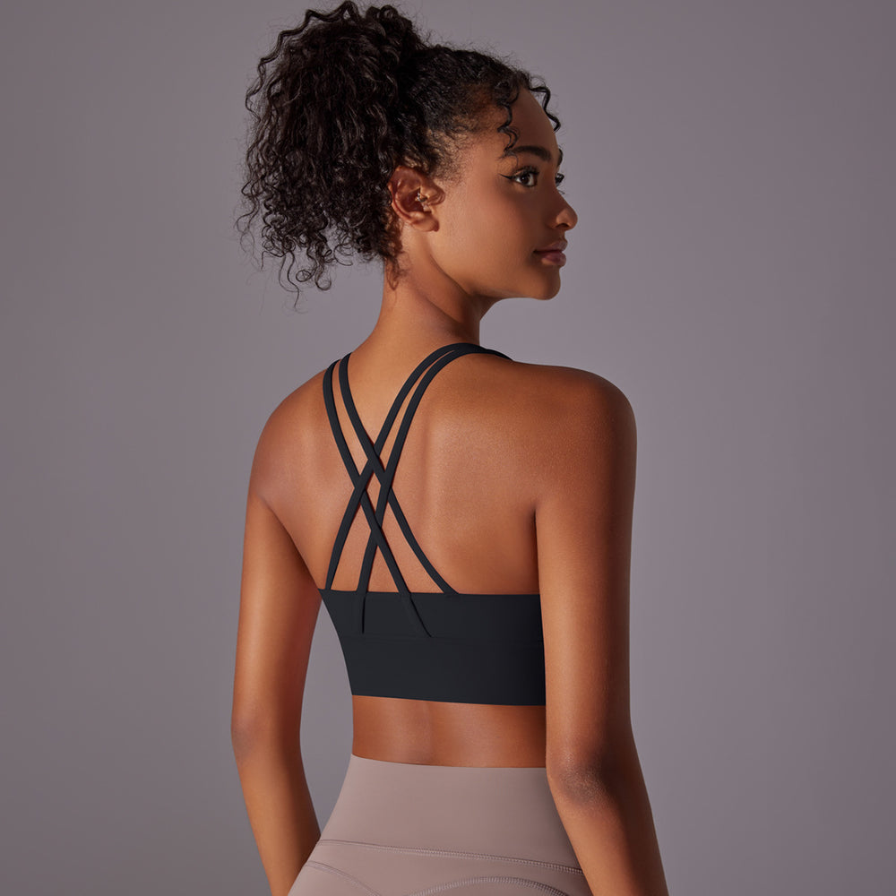 Fashion nude yoga vest women's cross back sports intimates bubble wrap push up seamless one-piece cup fitness bra