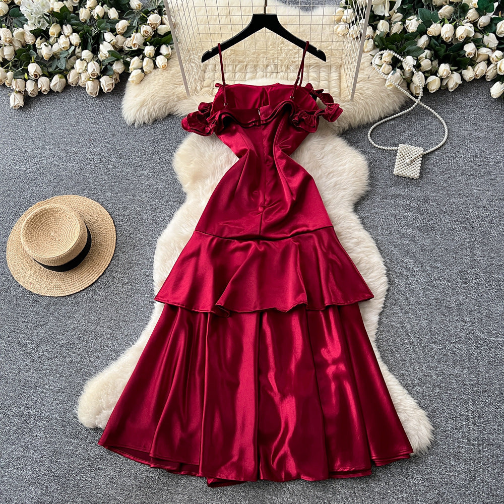 French red camisole dress with padded bust, satin, cinched waist, ruffle trim, sleeveless a-line, elegant party dress