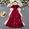 French red camisole dress with padded bust, satin, cinched waist, ruffle trim, sleeveless a-line, elegant party dress