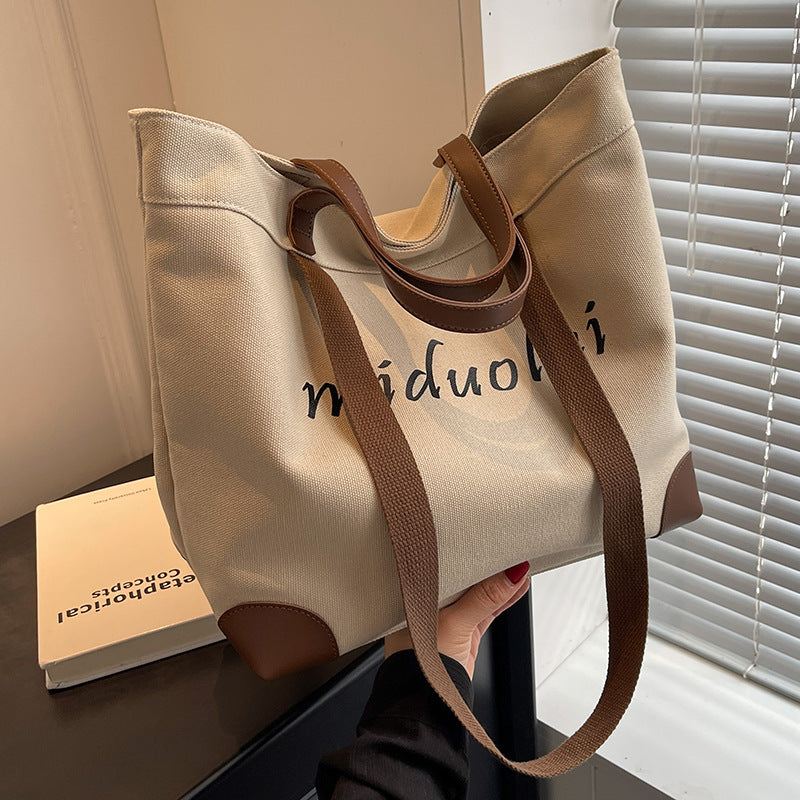 Canvas bag women's large-capacity 2023 new summer versatile simple shoulder bag cloth bag class commuter tote bag