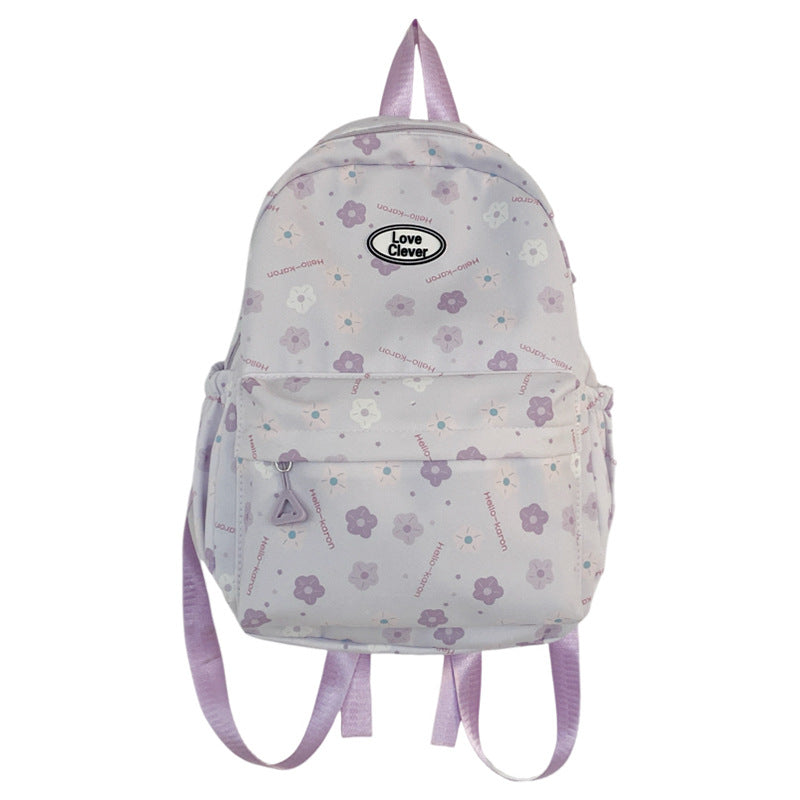 Niche original floral design schoolbag high value large capacity lightweight versatile backpack travel attendance backpack