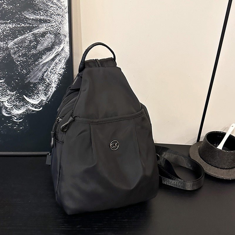 New fashionable women's washed cloth backpack, light and simple breast bag, versatile travel, large-capacity commuter bag wholesale