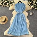 French-inspired v-neck floral chiffon dress with flared sleeves, tie waist, and a figure-flattering, vintage-inspired silhouette