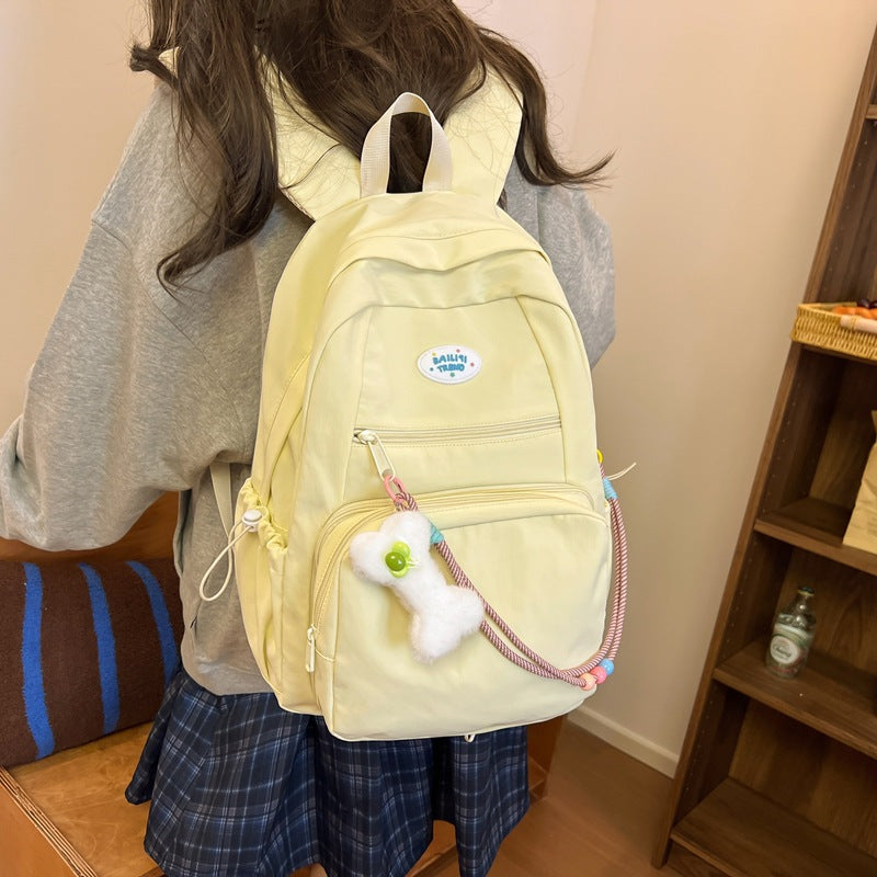 New personalized pain layer dual-purpose schoolbag large-capacity solid color removable pain bag primary school students middle school students backpack