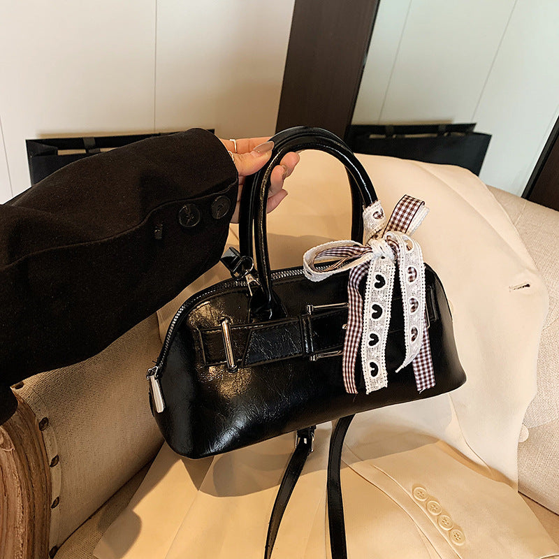 Dopamine girl hand shell bag 2025 spring and summer new Korean version shoulder bag fashion niche casual shoulder bag