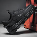 Men's waterproof, anti-slip, hard-wearing black work shoes - trendy, athletic, casual, breathable, spring-ready safety shoes for construction and labor