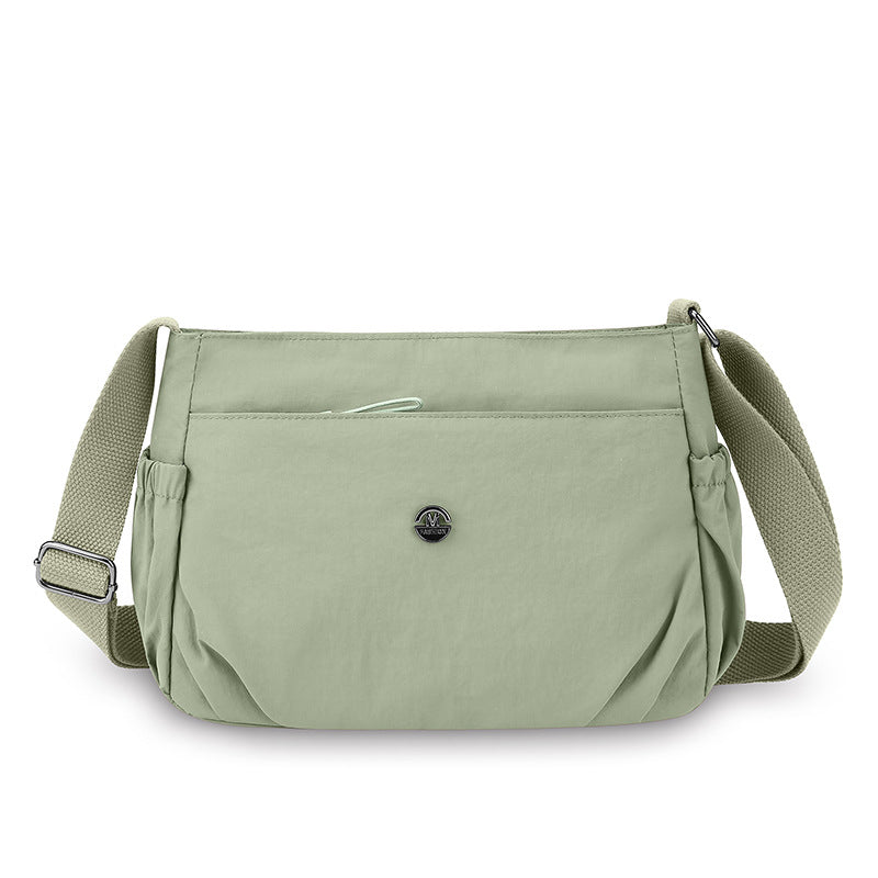 Simple new solid color shoulder bag women's light casual versatile outdoor small square bag fashionable commuter pleated messenger bag