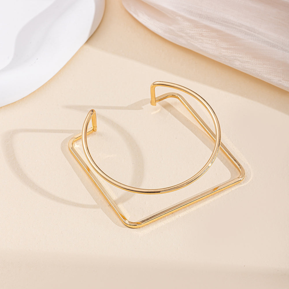 Wholesale alloy bracelets: european & american cross-border fashion jewelry - minimalist bangles with unique, bold geometric designs for women