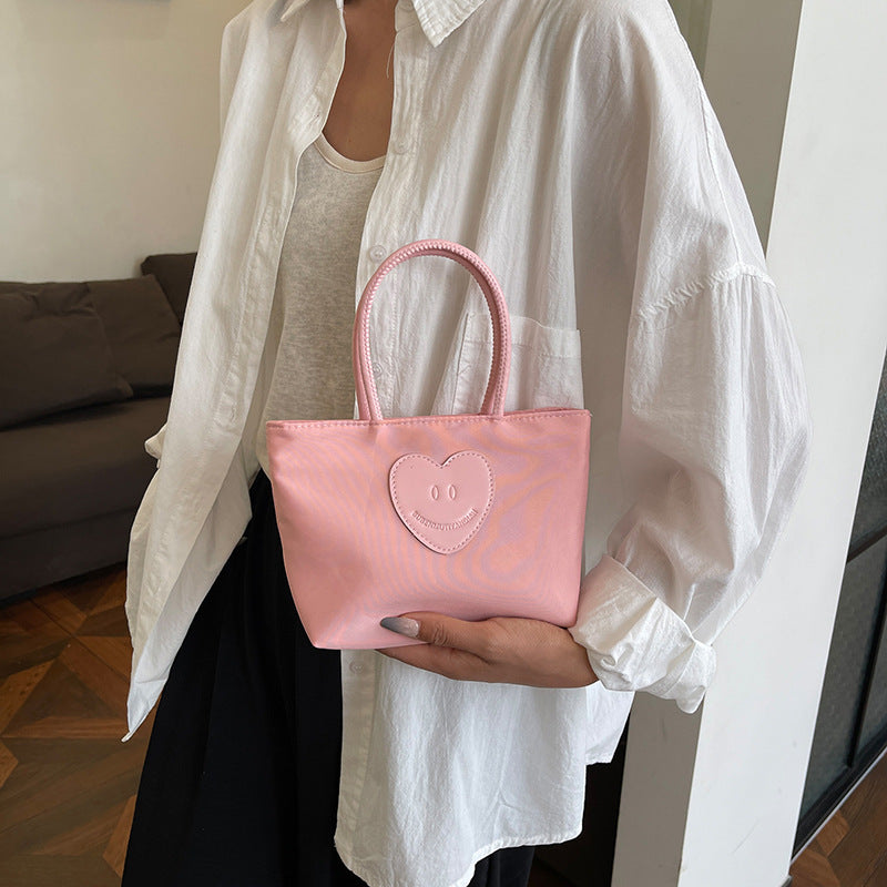 2025 Japanese simple nylon bag mini work small bag cute environmental protection bag student handbag practical mobile phone