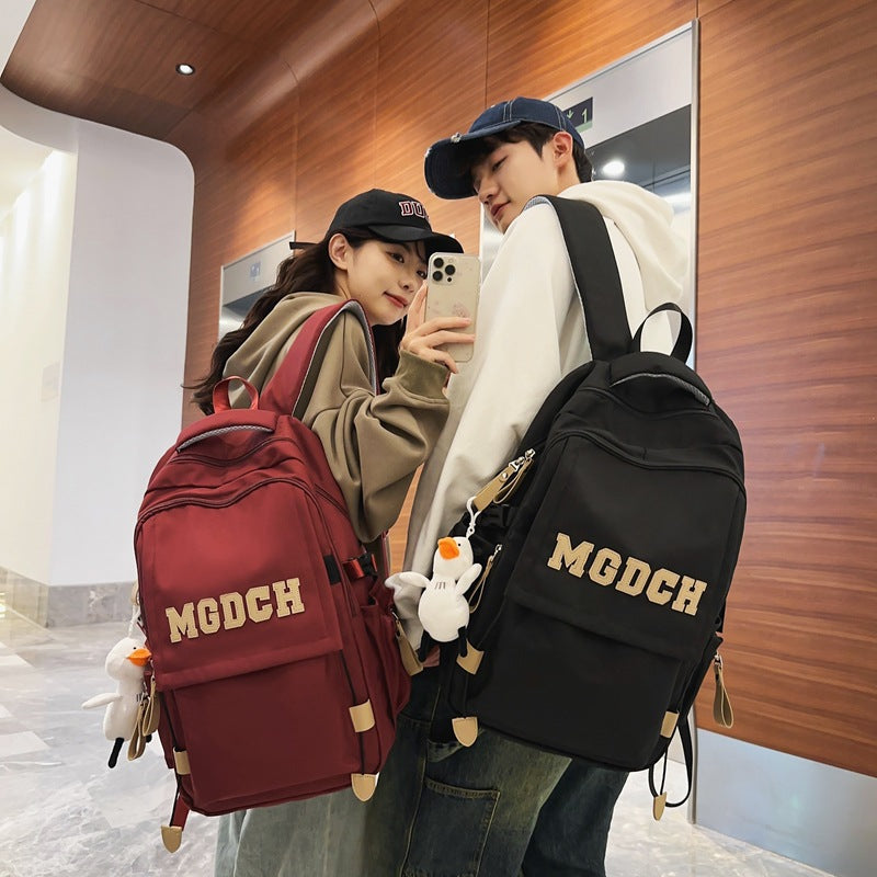 School bag women's new large-capacity backpack crossbody bag men's junior high school high school burden reduction primary school students diagonal span bag