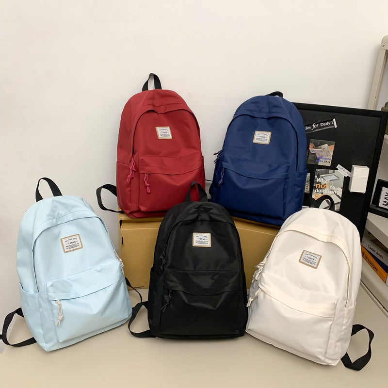 New fashion simple trend backpack large capacity lightweight travel backpack Korean version of junior high school student schoolbag