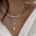 Wholesale faux pearl necklaces: european & american fashion, vintage-inspired, understated luxury, unique & high-end, choker necklaces with star pendants for women