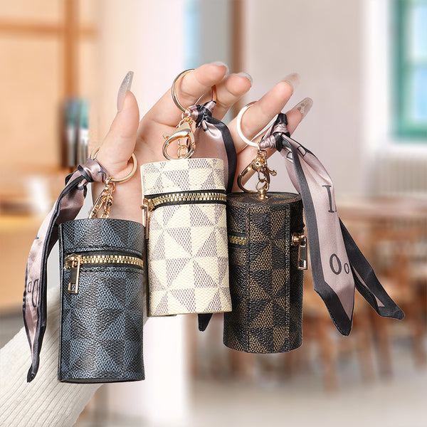 European and American old flower change bag 2024 new compact bag pendant earphone bag mouth red envelope mini keychain bag