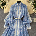 early spring resort style stand collar lantern sleeve printed single-breasted cinched waist dress - women's pleated elegant maxi dress