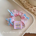 Blue sweet floral bow scrunchie hair tie - wholesale hair bands for ponytails, buns, and updos