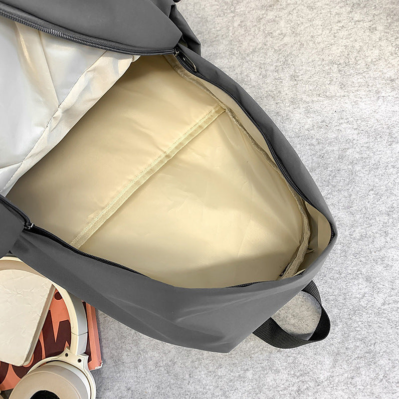 New large-capacity ins trendy and cool backpack, solid color middle and high school student travel bag, casual and simple computer backpack
