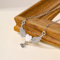 New arrival cross-border jewelry european and american diamond-encrusted acrylic pendant simple and versatile alloy angel wings necklace for women