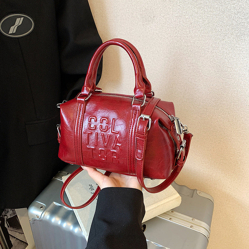 Cross-border simple casual handbag bag women's 2025 new versatile shoulder messenger bag fashionable commuter pillow bag